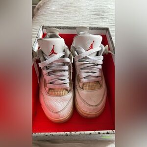 Nike Air Jordan 4 Retro "White Oreo" sneakers.